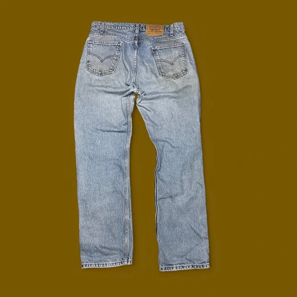 Levi’s 505 Vintage Orange tab Light Wash Jeans
